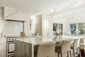 Signature kitchen remodel with custom cabinetry and island
